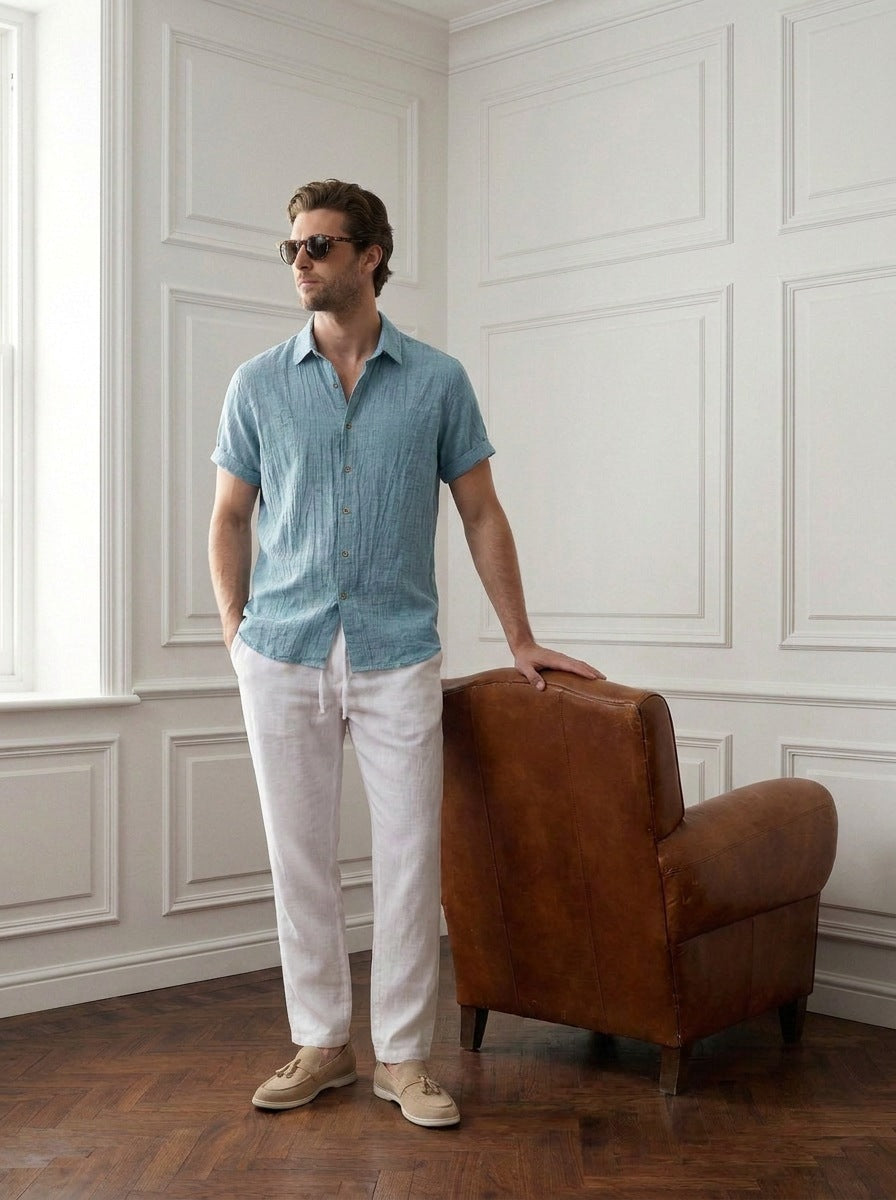 Richmond celeste - Modelo J apoyado sillon.jpg